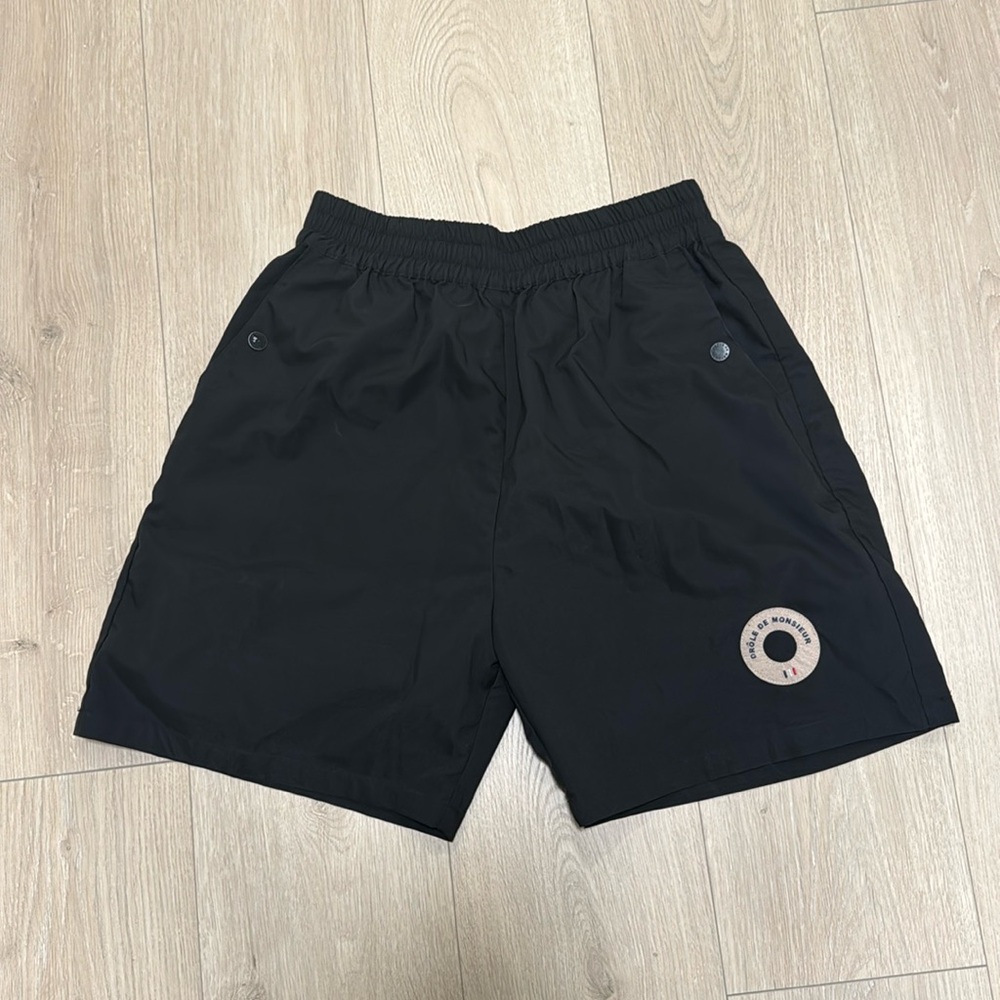Drôle de monsieur swim trunks